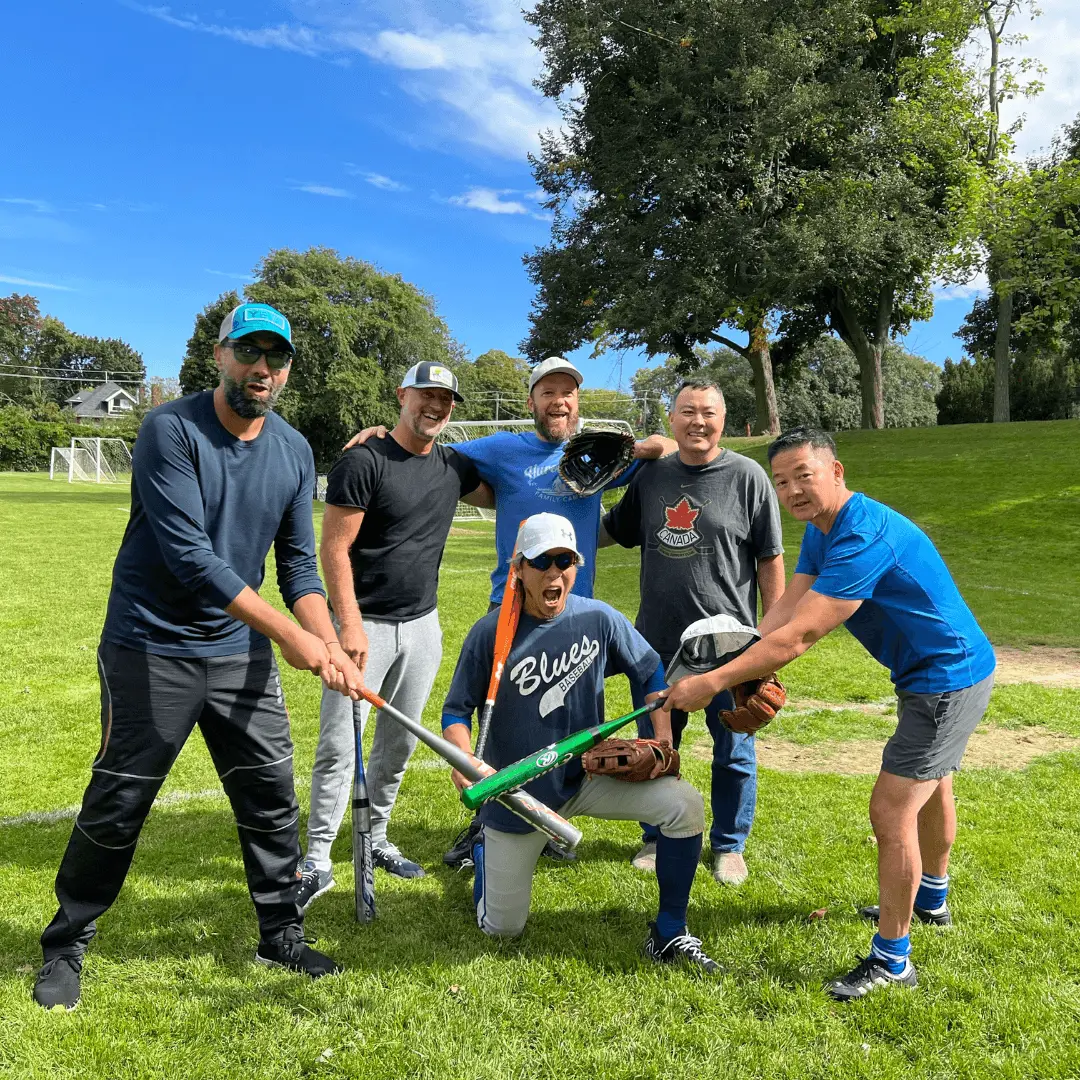 Alumni play softball at Association Day