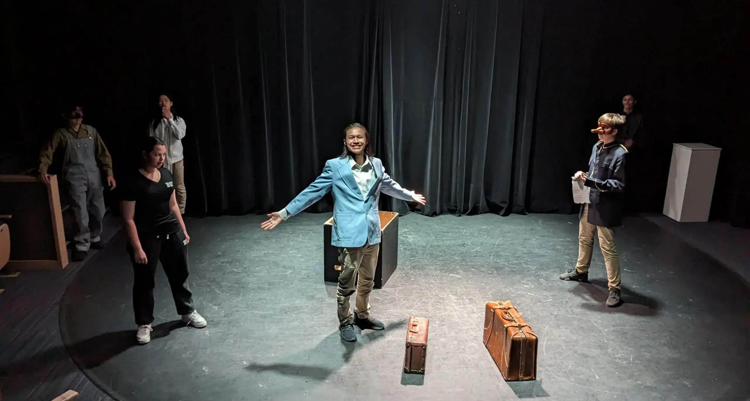 Students Performing in Play on Stage