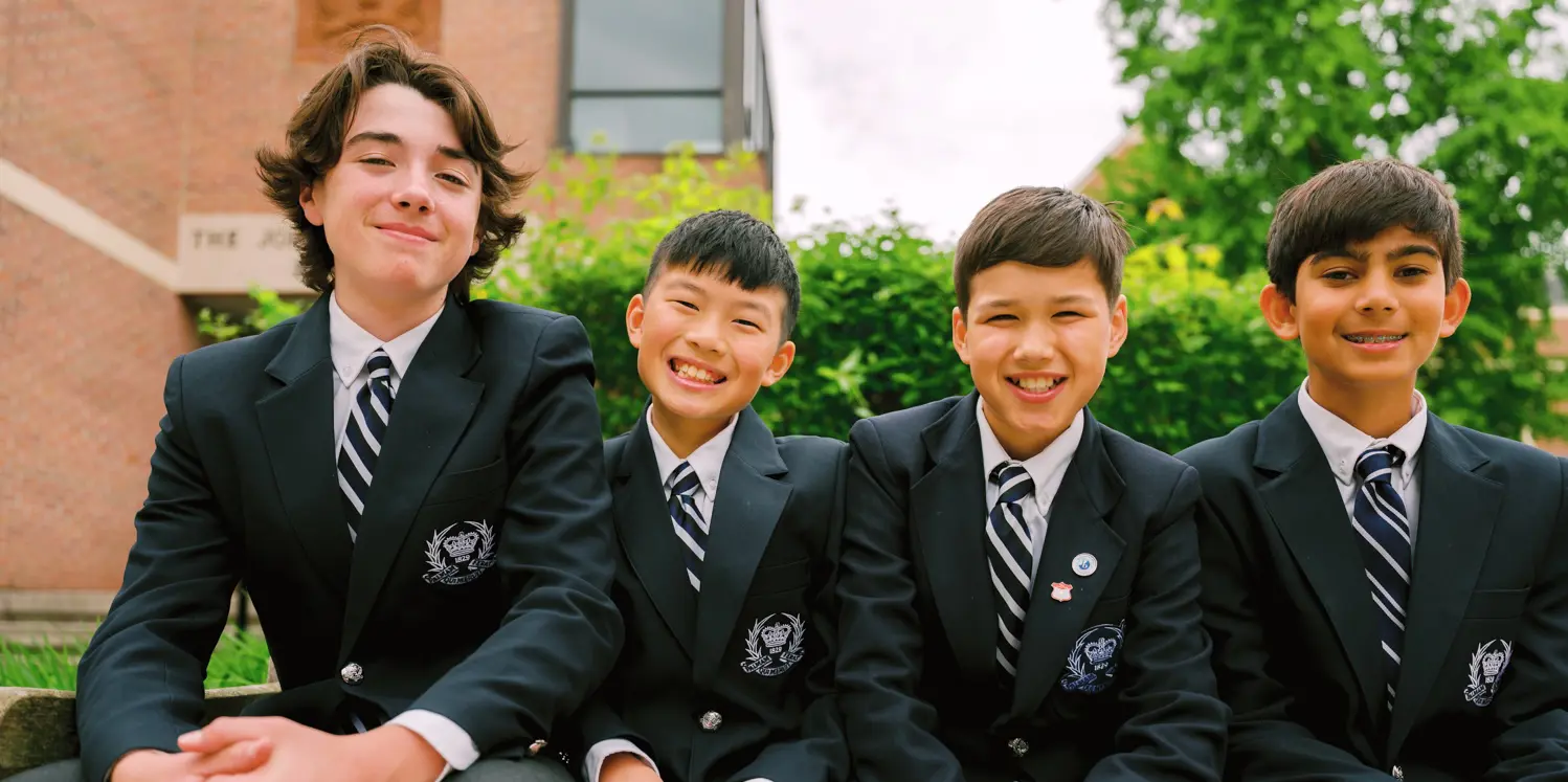 Students smiling in garden